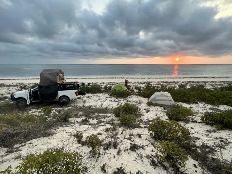 Camping Southwest Coast madagascar roadtrip africa nissan with rooftop tent ground tens sunset