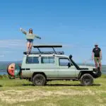 Father Daughter On Landcruiser In Murchison
