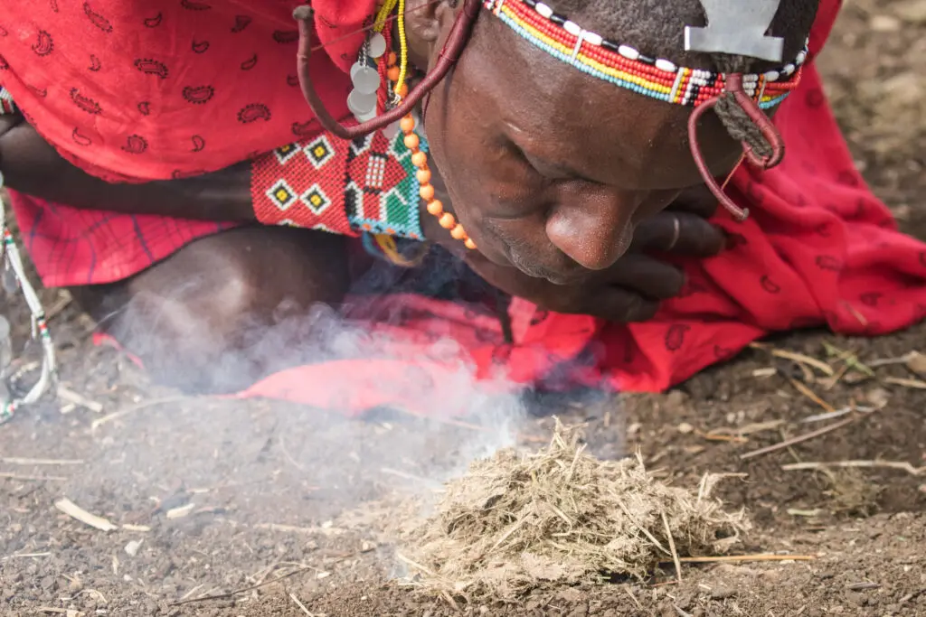Masaai Starting Fire Closeup Mark Schutz