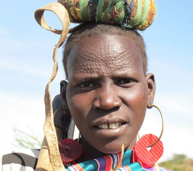 Close up portrait Karamajong women with earrings