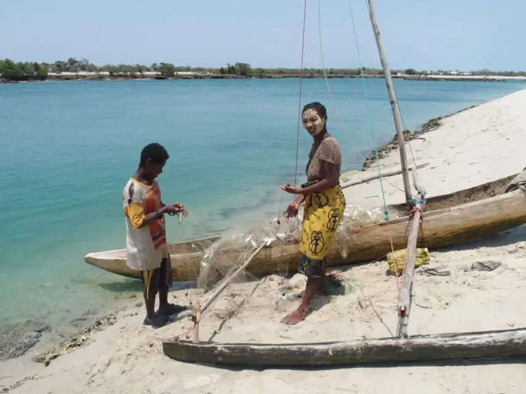 Vezo People Boat And Painted Face