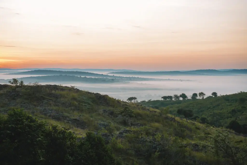 misty valley landscape at sunrise in Uganda